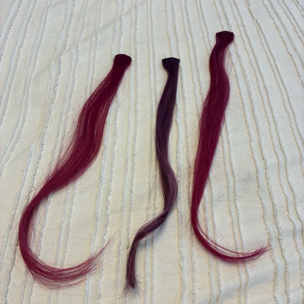 Funky set of hair extensions. 2 pink and 1 purple. GUC. Clip in easily